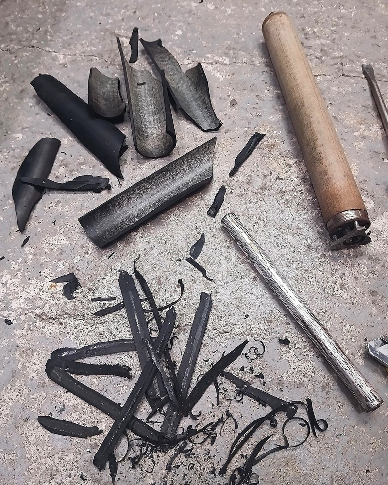 Removing the old rubber from the cylinder