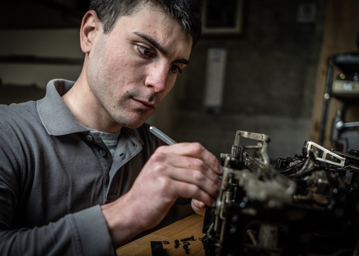 Alessio working on typewriter