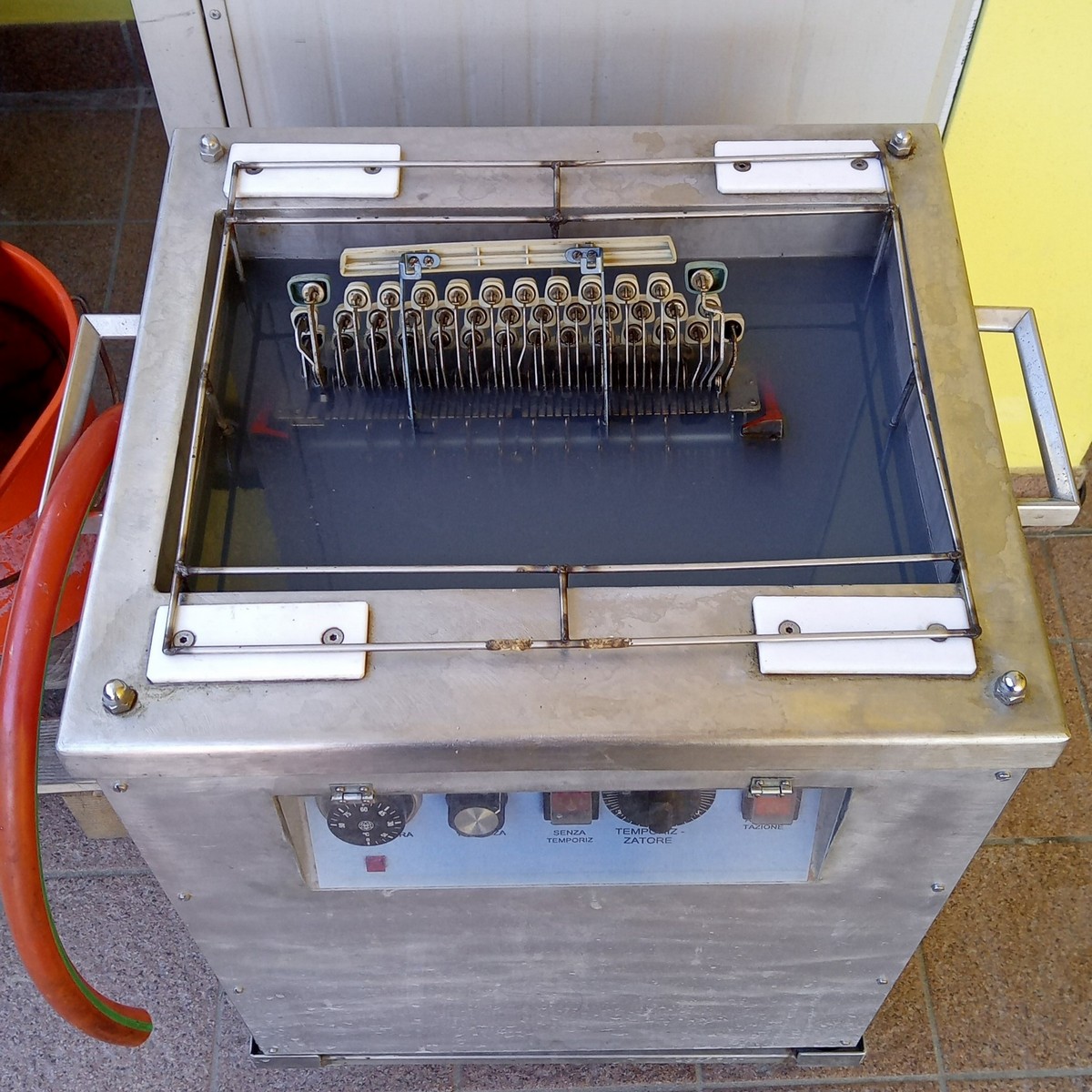 Olympia SG1 typewriter naked mechanic during ultrasonic washing